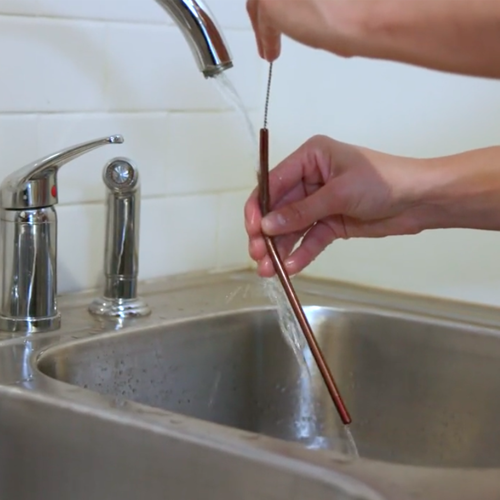 Have tiny cleaning brushes for straws? Don't lose them down the drain by  putting a key ring on the end. : r/lifehacks
